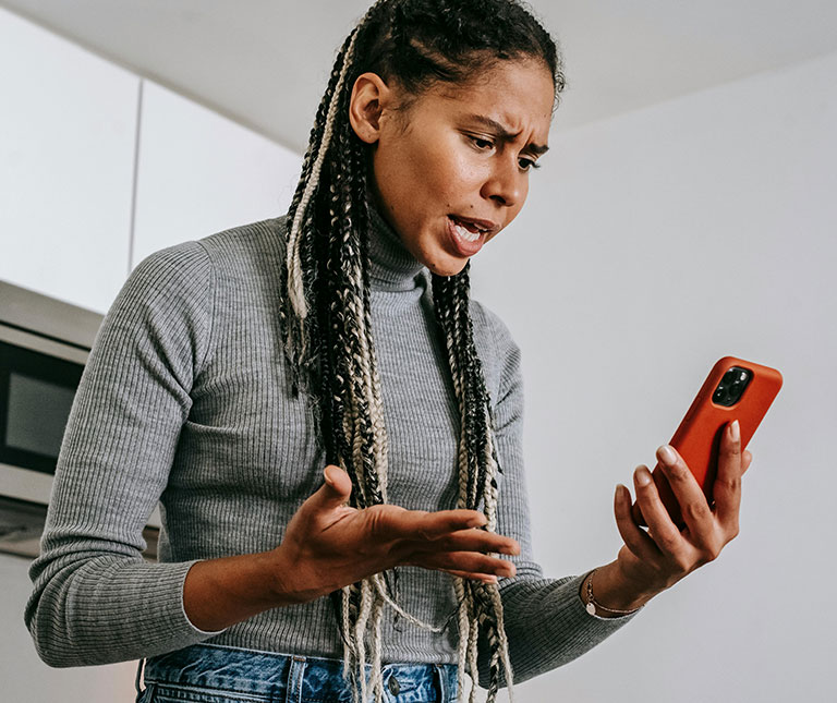 Woman Angry and in Disbelief on the Phone