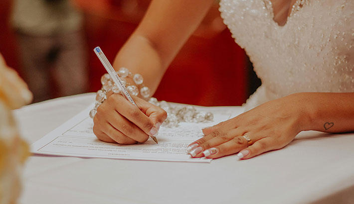 Bride Signing a Contract